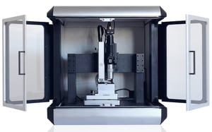 FT-I04 Femto-Indenter, a standalone MEMS-based nanoindenter for material property analysis, with open doors.