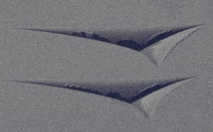 SEM image of Berkovich indentations revealing mechanical properties of a material via nanoindentation.